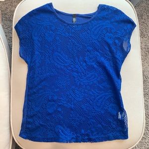 Full Tilt Blue lace shirt in size M (7-8).